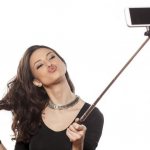 how to connect a selfie stick to your phone