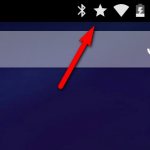 How to remove the star on the corner of the screen on an Android phone