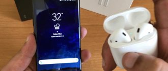 smartphone with android and airpods